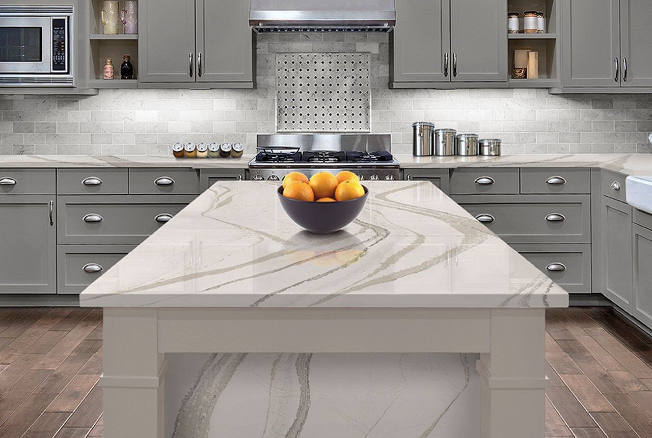 Polished veined stone island restored by Marble Complete
